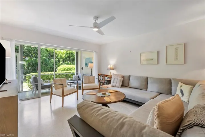 Living room featuring ceiling fan