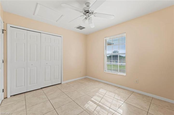 Laundry space inside of the garage with service entrance