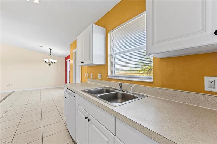 Kitchen sink overlooks the backyard