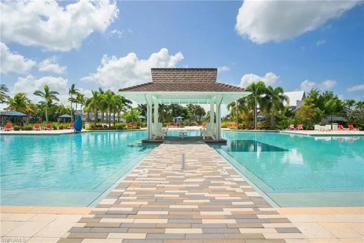 Community pool featuring a patio area and a gazebo