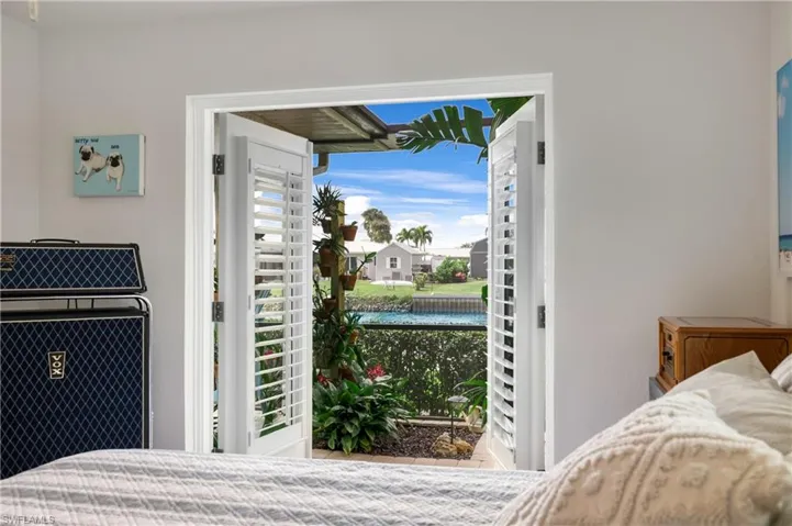 Bedroom featuring a water view