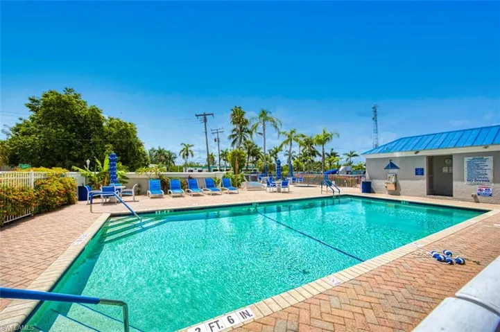Community pool featuring a patio area
