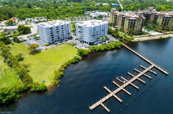 Aerial view of a large body of water and apartment complex