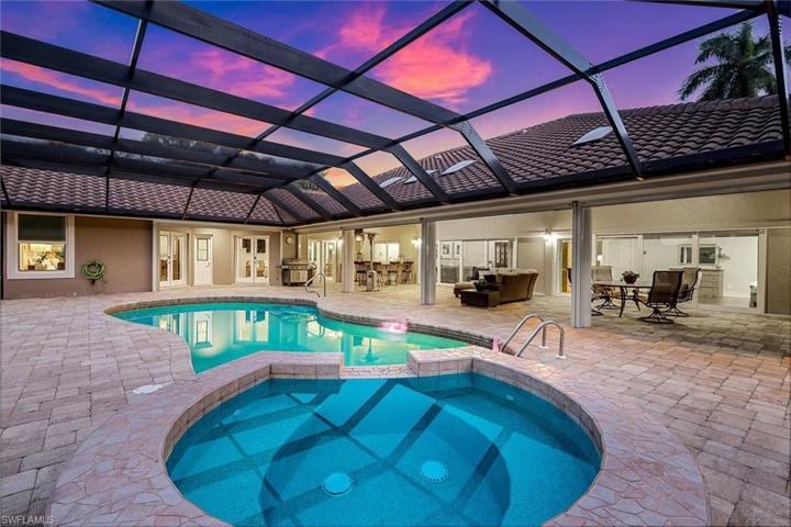 Spacious brick paved lanai with pool & spa