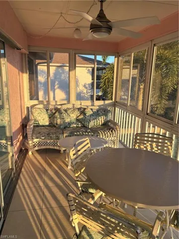 Very large lanai on a corner with full length pocket sliders in to the home