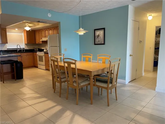 Light and bright dining area with tile floors