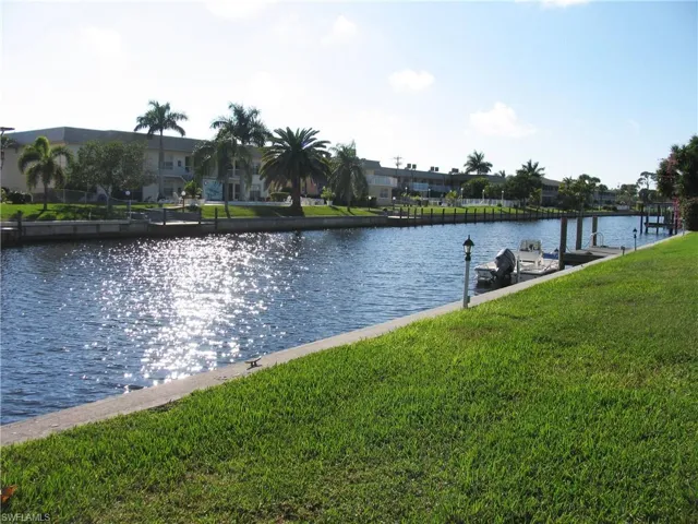 View down the SE Cape Coral wide canal with tons of fish and wildlife