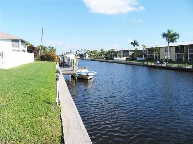 View down the Gulf Acccess SE Cape Coral wide canal with tons of fish and wildlife