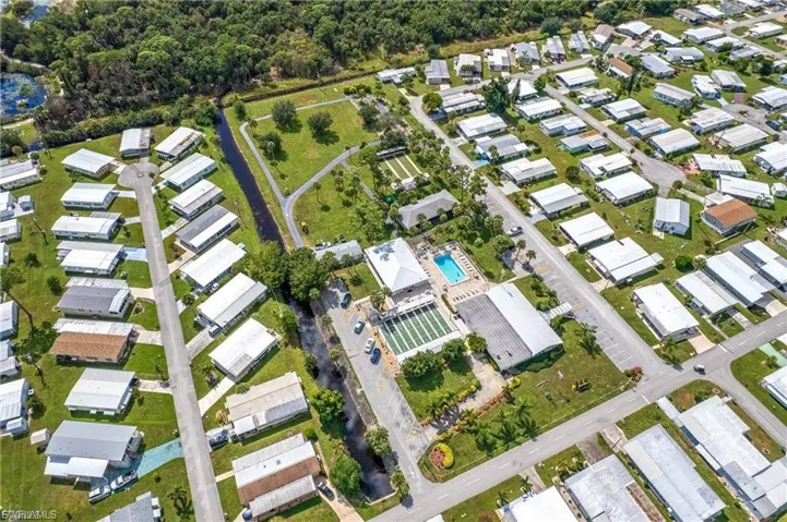 View of property location with nearby suburban area