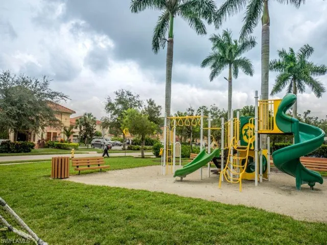 Communal playground featuring a lawn