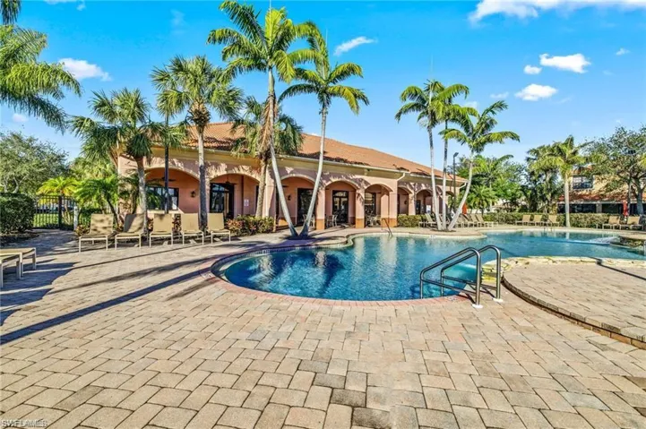 Community pool featuring a patio area