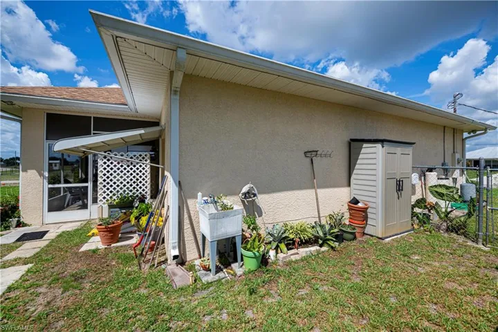 View of property exterior with stucco siding