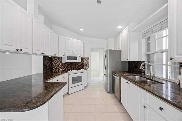 Granite Countertops, Backsplash and Stainless Appliances