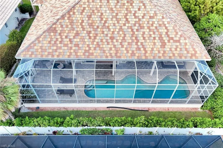 View from above of property featuring a pool