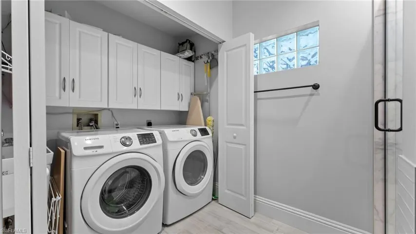 Indoor Laundry Closet with wonderful overhead storage!