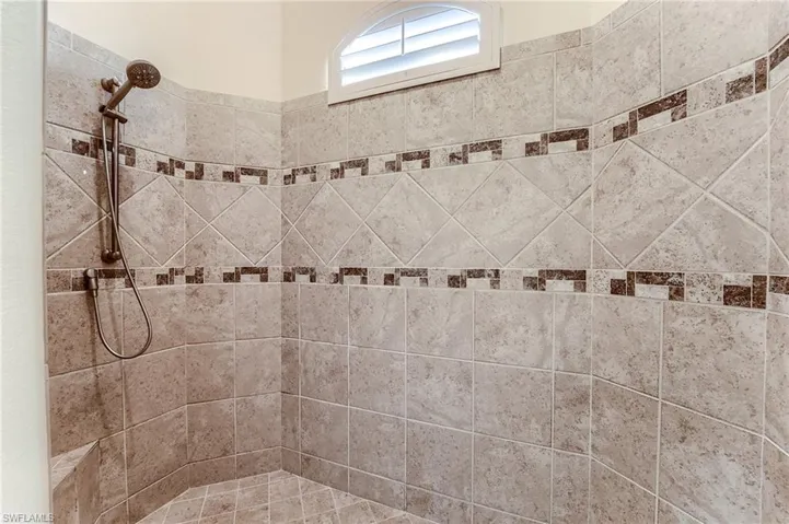 Bathroom with tiled shower