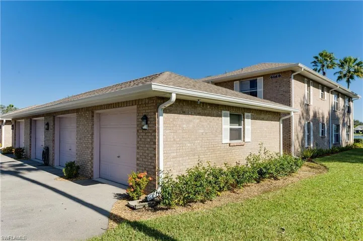View of home's exterior featuring a yard