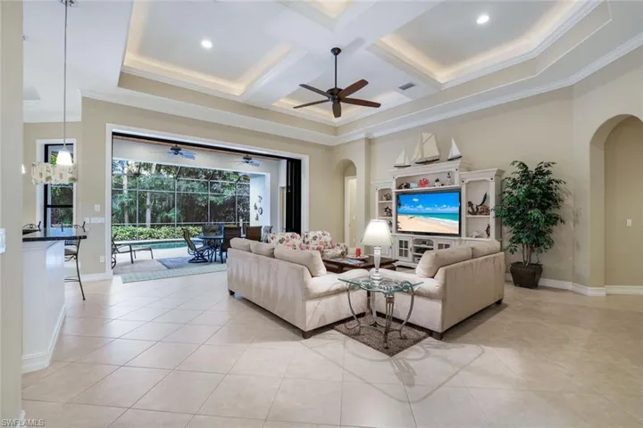 Great Room with  High, Architecturally Accented Ceilings, and Disappearing Sliders to Lanai