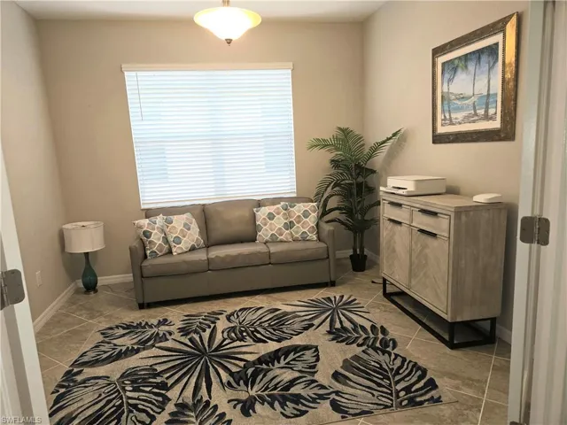 Large den with Frendh doors
