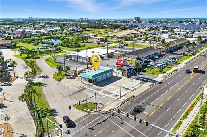 GREAT CORNER location at a signalized intersection — the busy gateway to Fort Myers Beach!