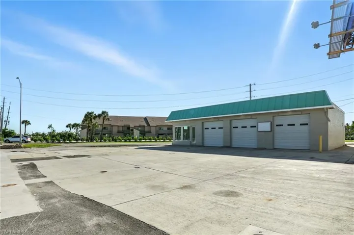 Front view with huge parking lot!