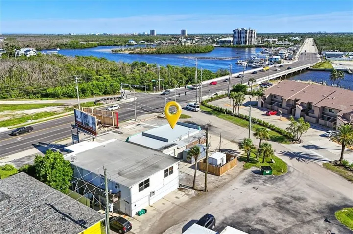 GREAT CORNER location at a signalized intersection — the busy gateway to Fort Myers Beach!