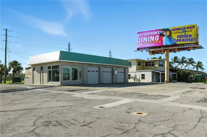 Front corner view with huge parking lot!