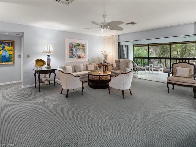 Livingroom with sliders that open to lanai