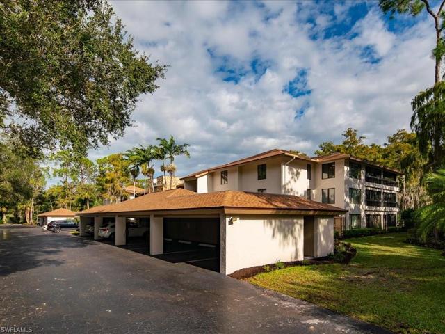 Carport and view of third floor condo
