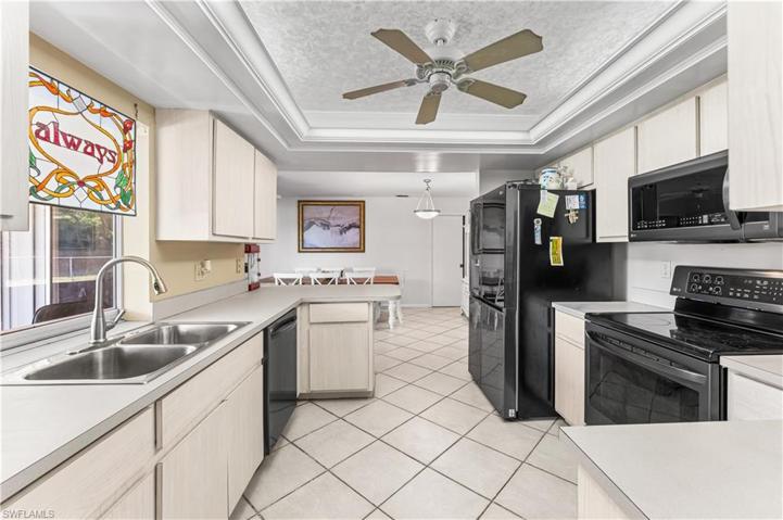 Large kitchen with updated appliances.