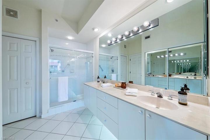Ensuite bathroom in primary bedroom with large shower