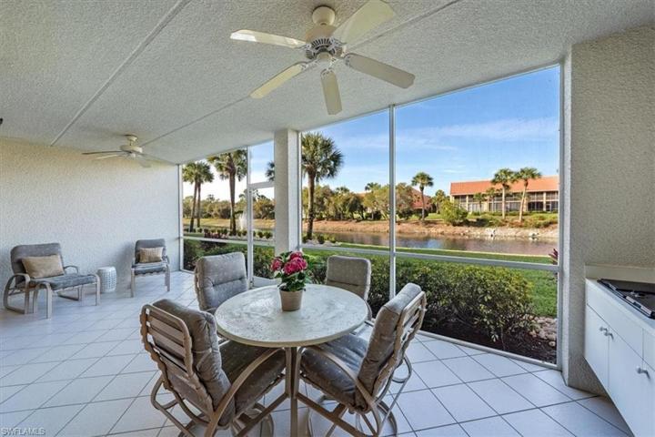 ake & pool views from oversized lanai & outdoor kitchen