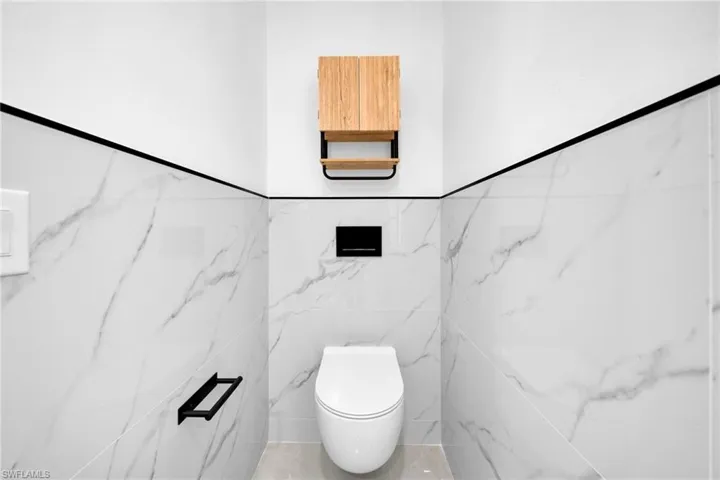 Bathroom with tile walls