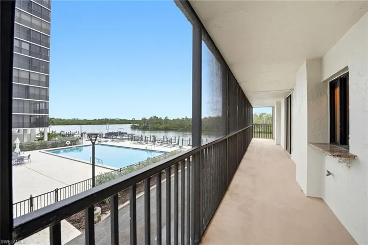 Wrap-around lanai with pool and water views
