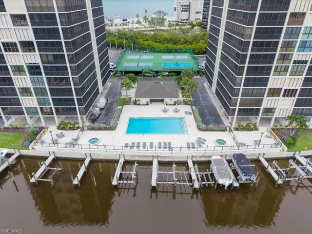 Pool with 2 hot- tubs and grilling area