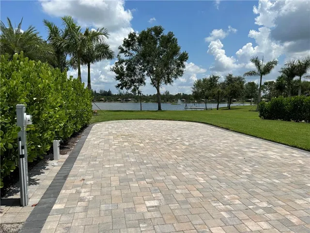View of community featuring a water view