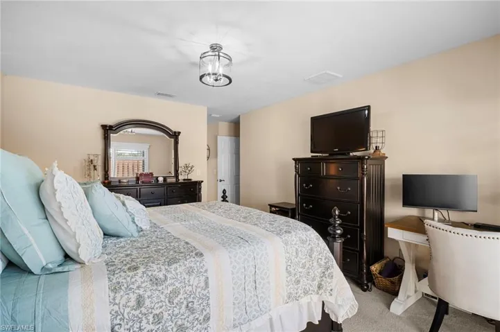 Bedroom featuring carpet
