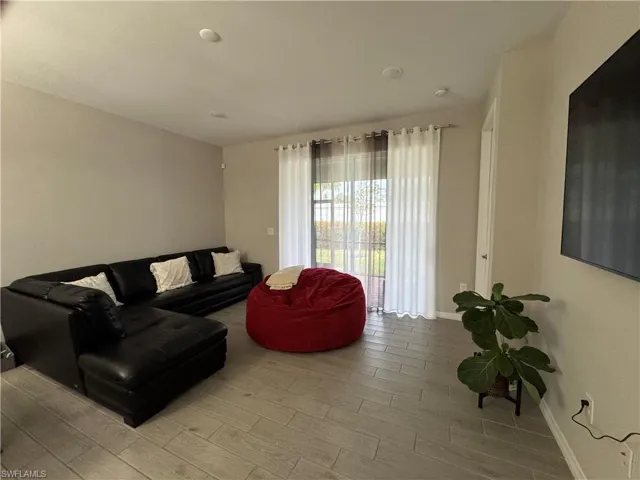 Living room featuring light hardwood / wood-style floors