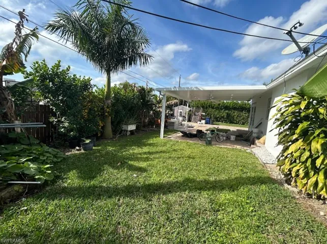 Fenced yard with a patio