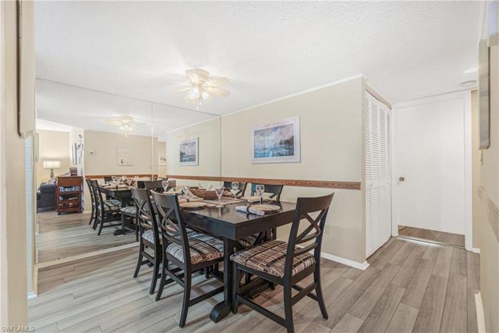 Dining area looking toward Bedroom 2. Louvered doors go to utility & added storage.