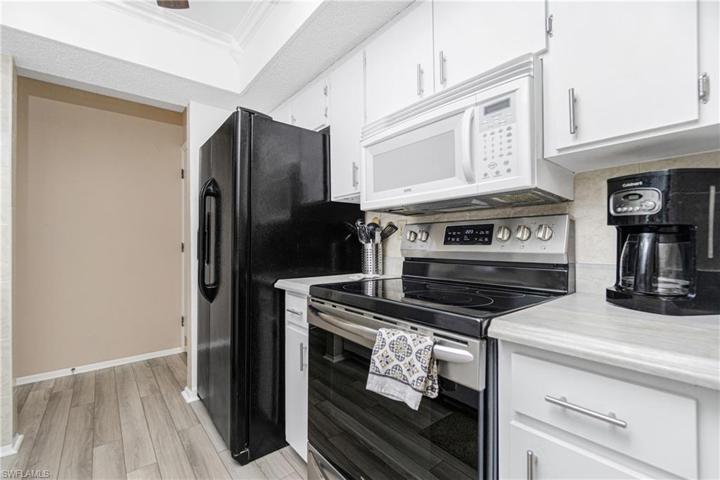5-burner smooth top range, frig & microwave ready for serving up fun.