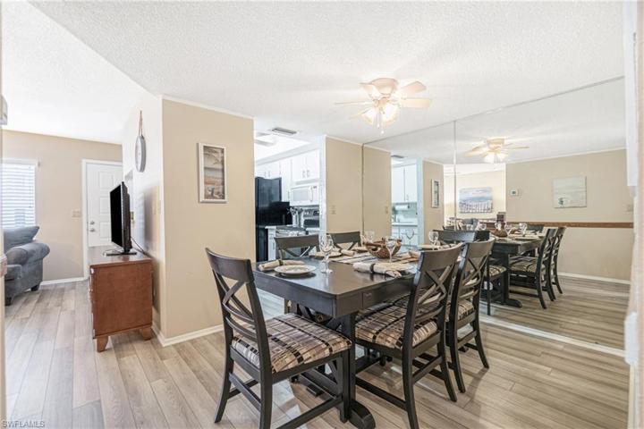 The Dining alcove extends from the Living Room with access to the Kitchen.