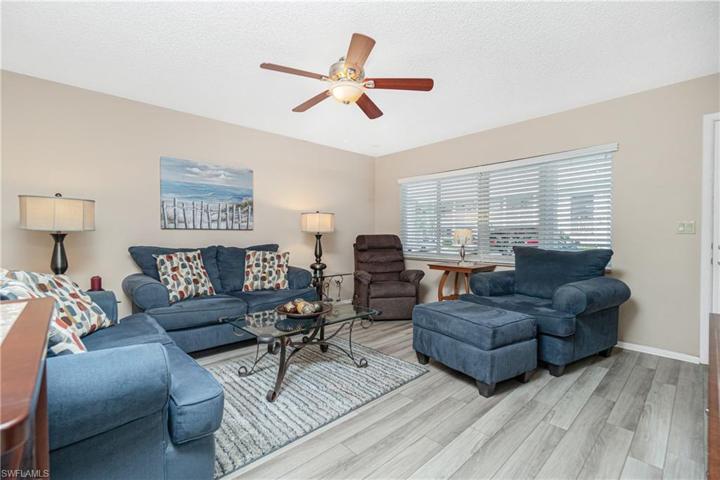 Living Room features 4 sliding windows to be bright & cheerful.