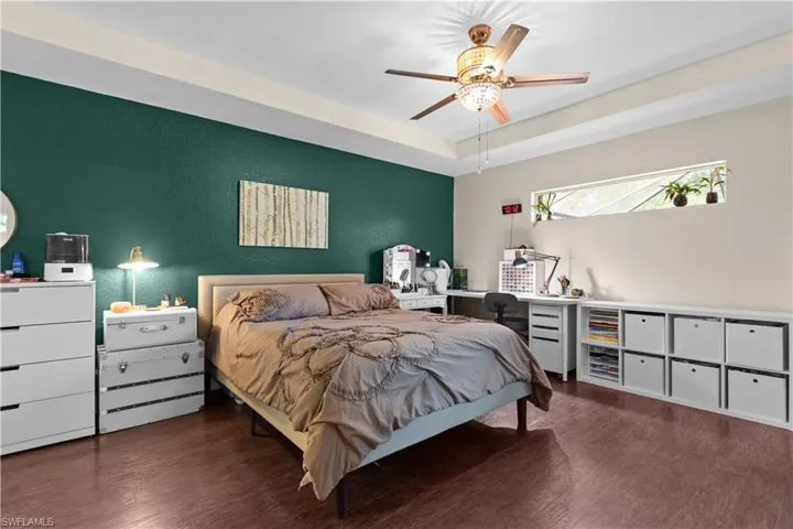 Large primary ensuite with Tray ceiling and transom window