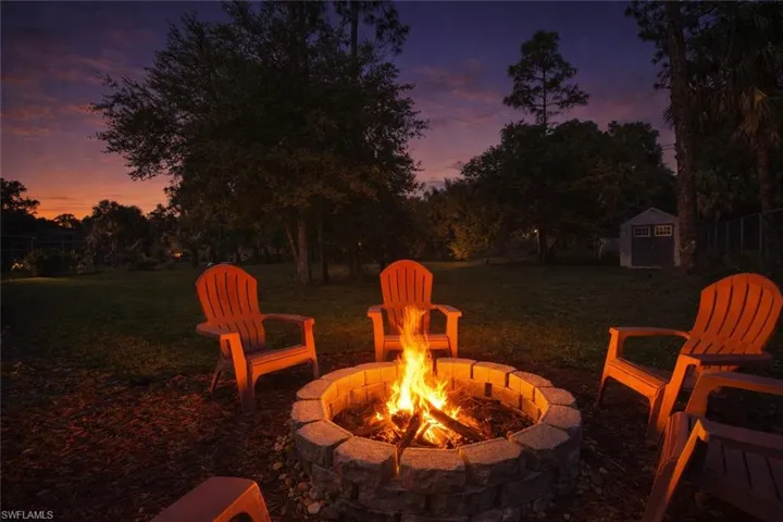The property features a stone-built fire pit