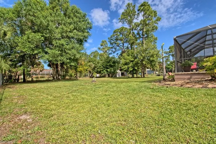 Half acre lot with large fenced in backyard