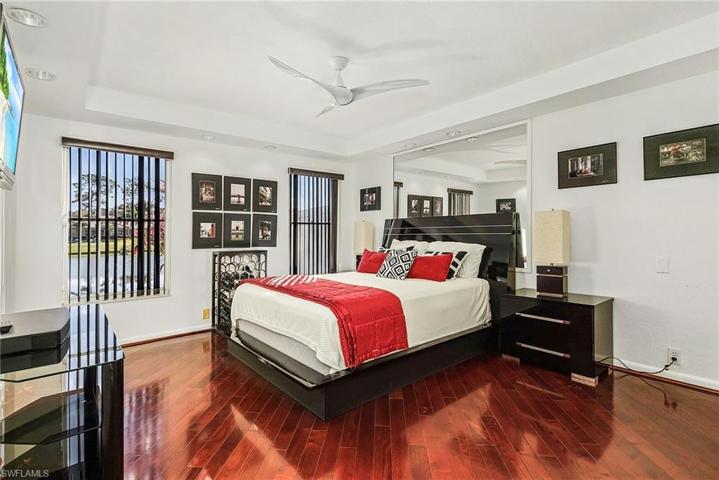 Guest bedroom has beautiful lake views.