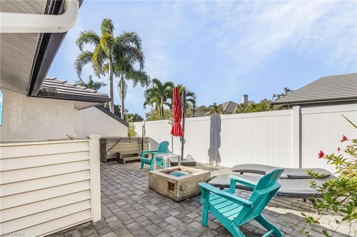 Private sun deck with built-in gas fire pit.