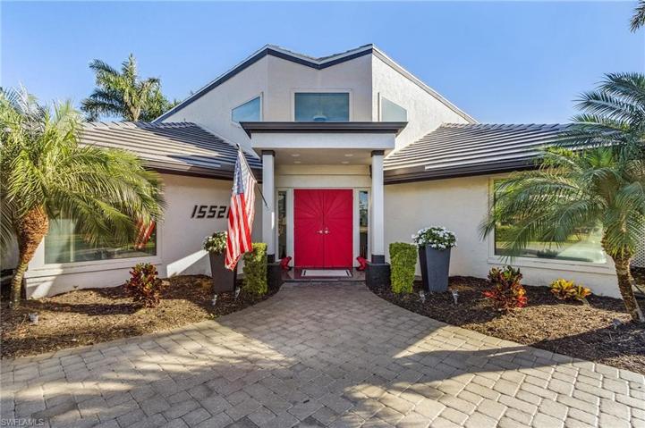 Covered entry with paver walk way.
