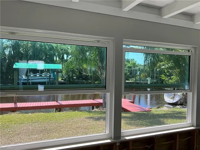 Lovely water views from Sun Room Large storm windows.